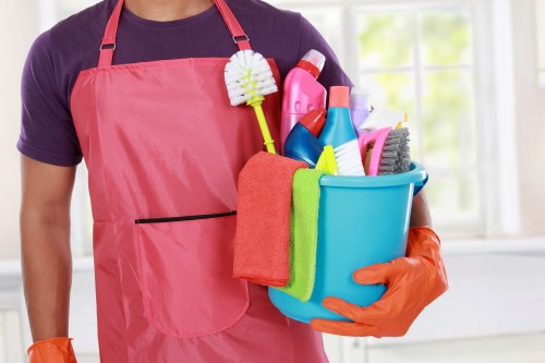 Carpet cleaning technician preparing a safe and insured service in Chiswick