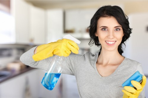 Commercial cleaner working in a Chiswick office reception area