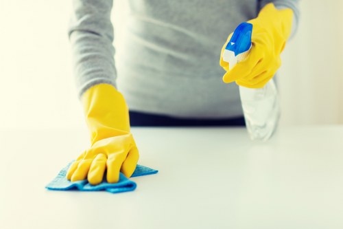Safety-focused carpet cleaning team working in a property
