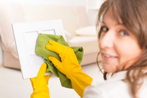 Carpet cleaning team maintaining safe, tidy work area